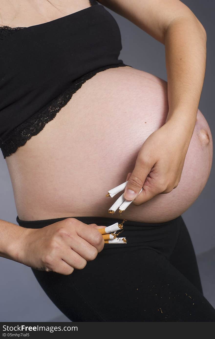 Pregnant Woman Expecting Baby Breaks Tabacco Cigarettes No Smoki