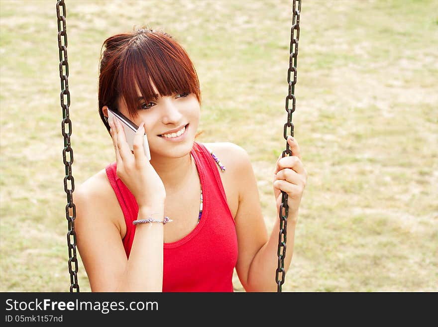 Beautiful girl with mobile phone-happy girl