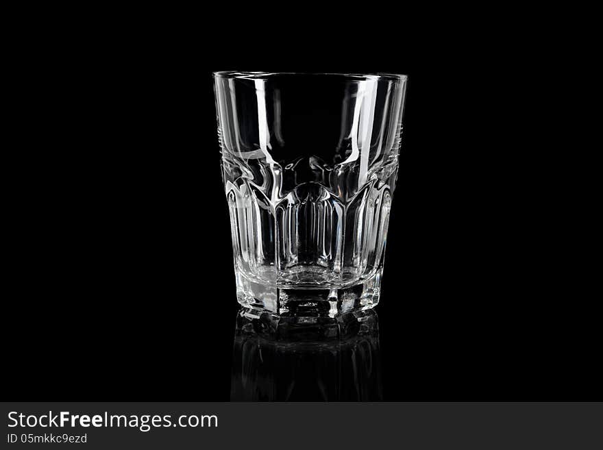 Empty glass on black background, crystal clear