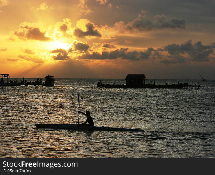 Beautiful sunset at beach located on the Promontory of the island of Java Karimun