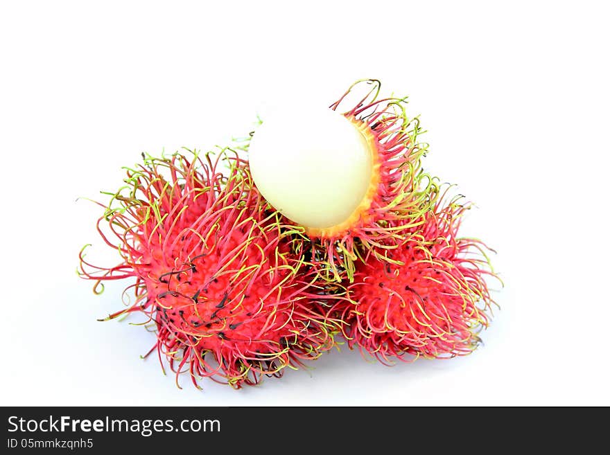 Rambutan fruits on a white background