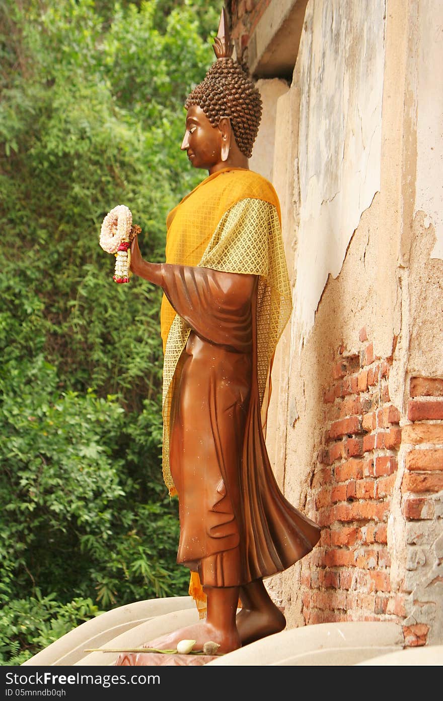 Buddha image stand front of the temple in Ayutthaya