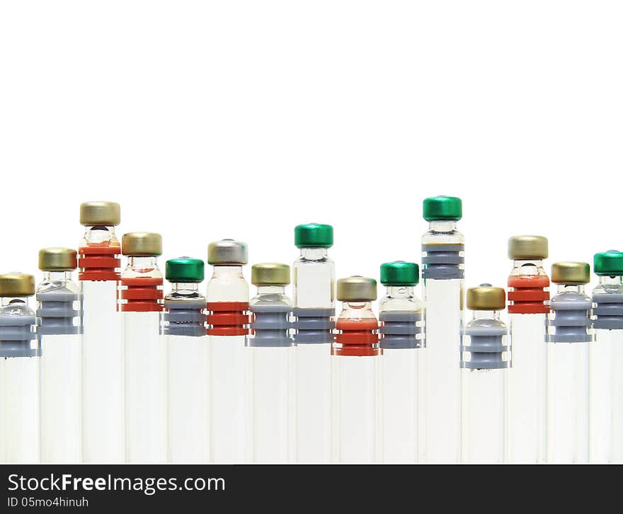 Row of medical vial isolated on white background