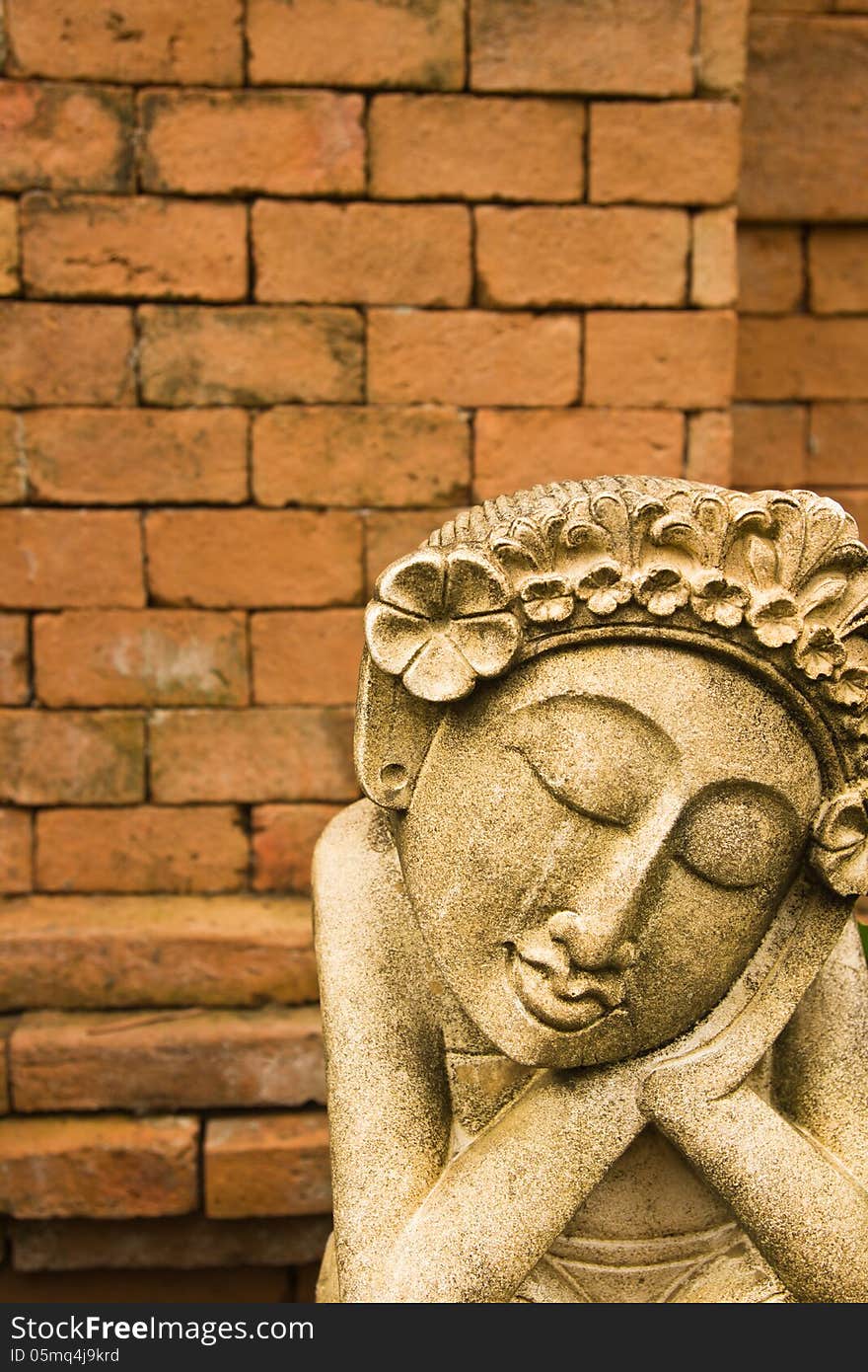 Femal Statue  With Brown Background.