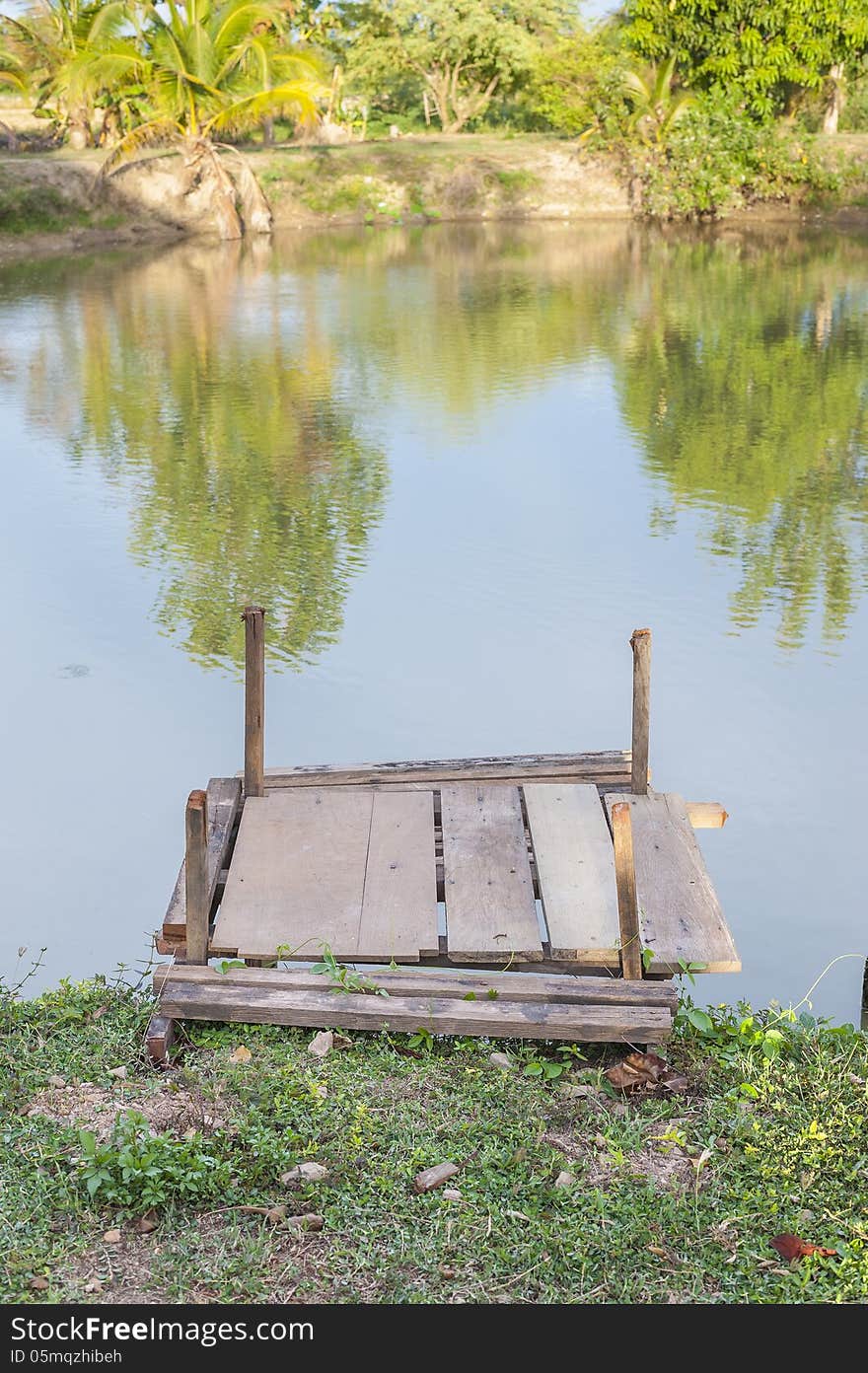 A wooden pier at waterside