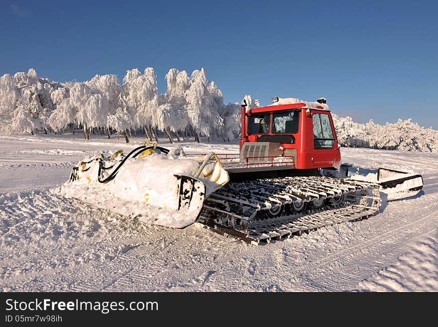 Big snowplow at the ski slope