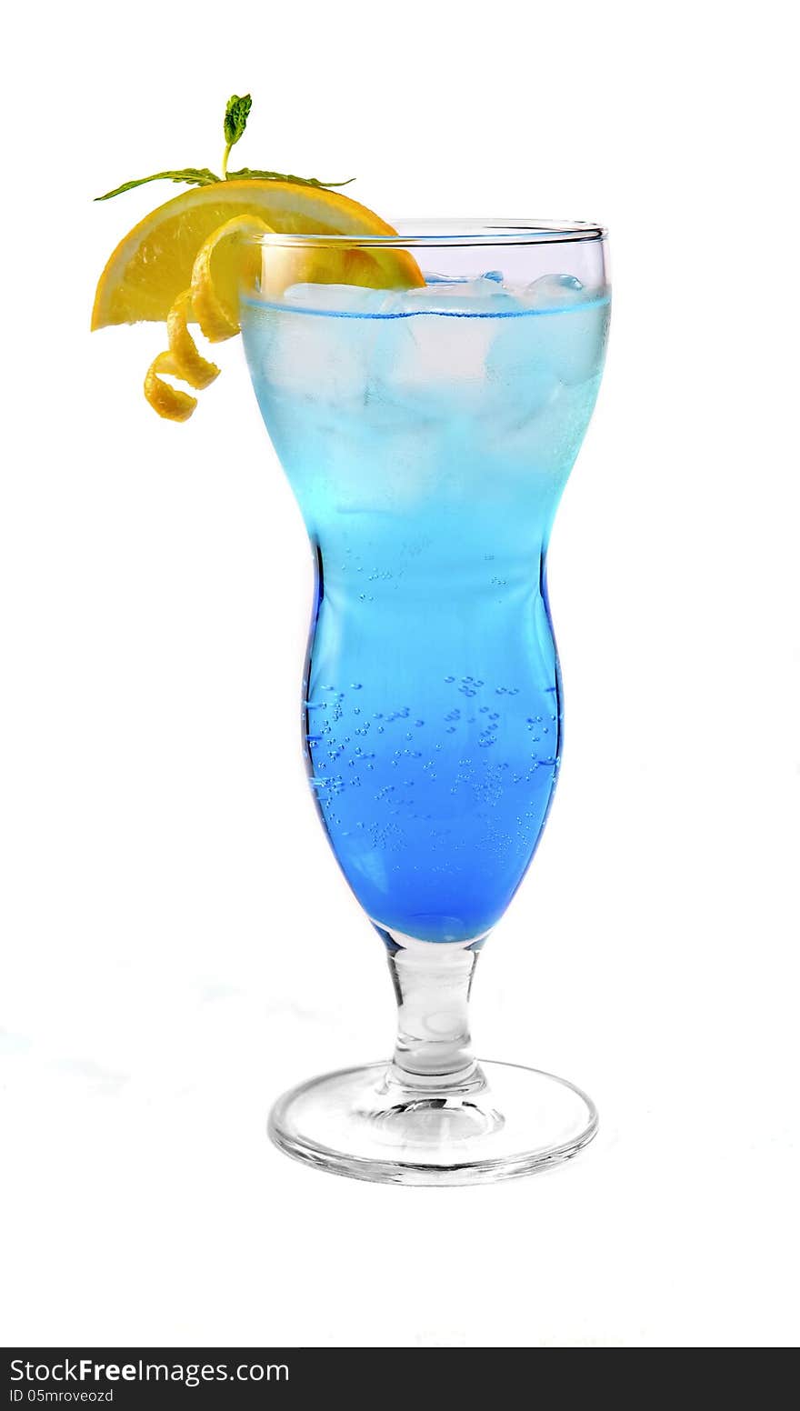 Blue cocktail with ice and orange