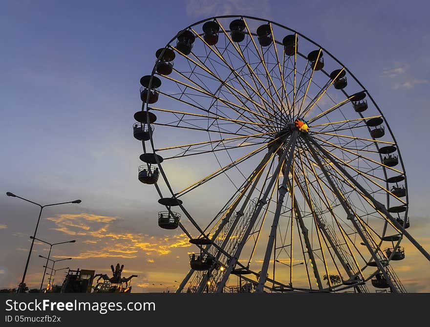 The big ferris wheel with blue sky