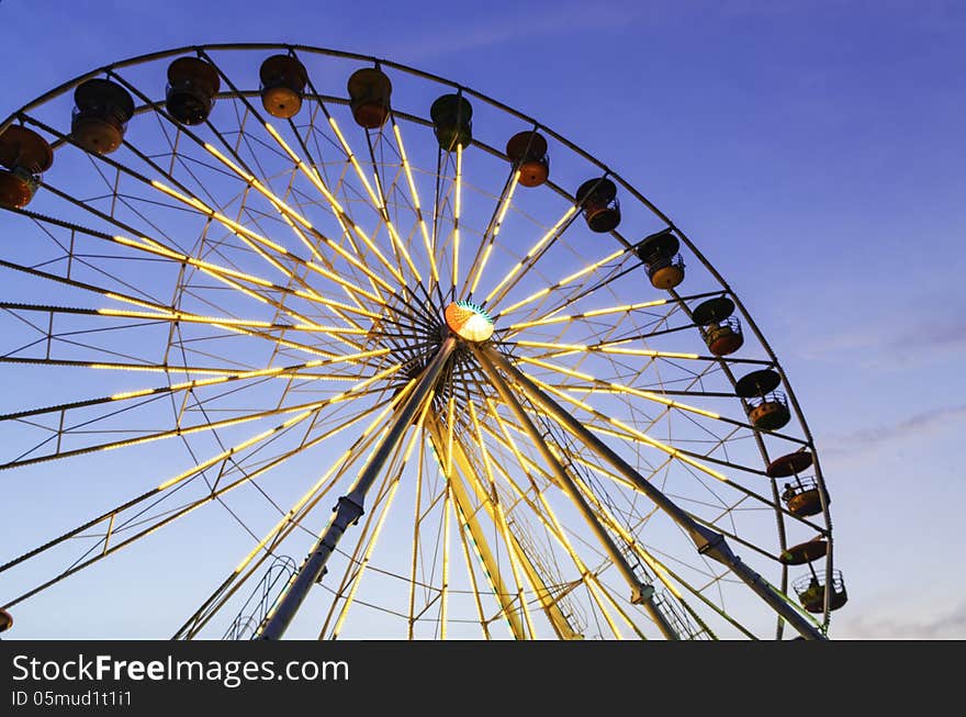 The big ferris wheel with blue sky