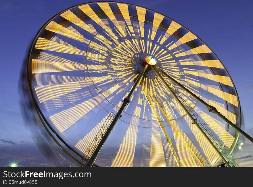 The big ferris wheel with blue sky