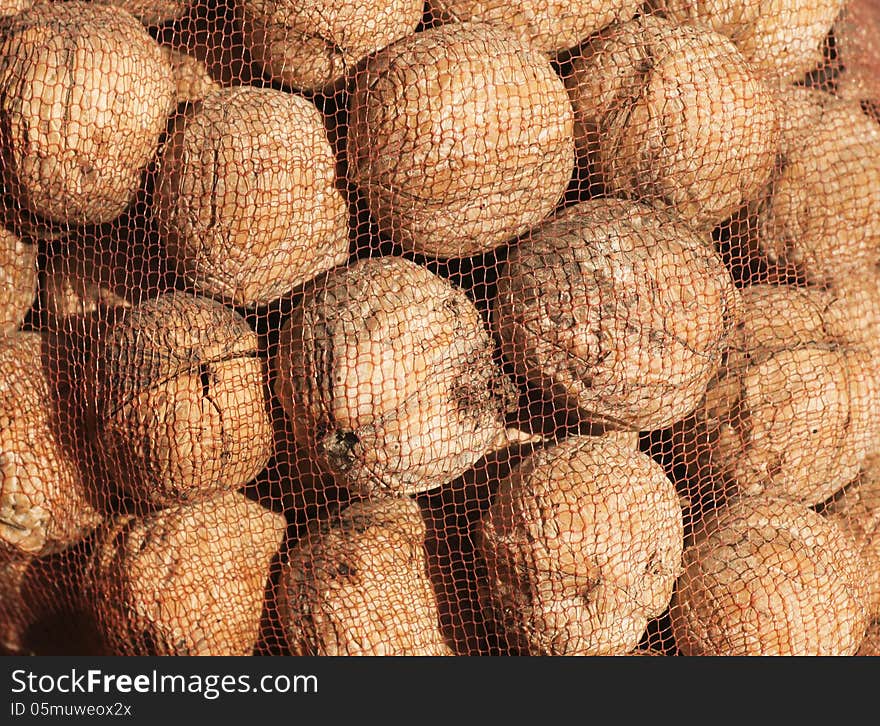 Background Of Nuts Under A Net