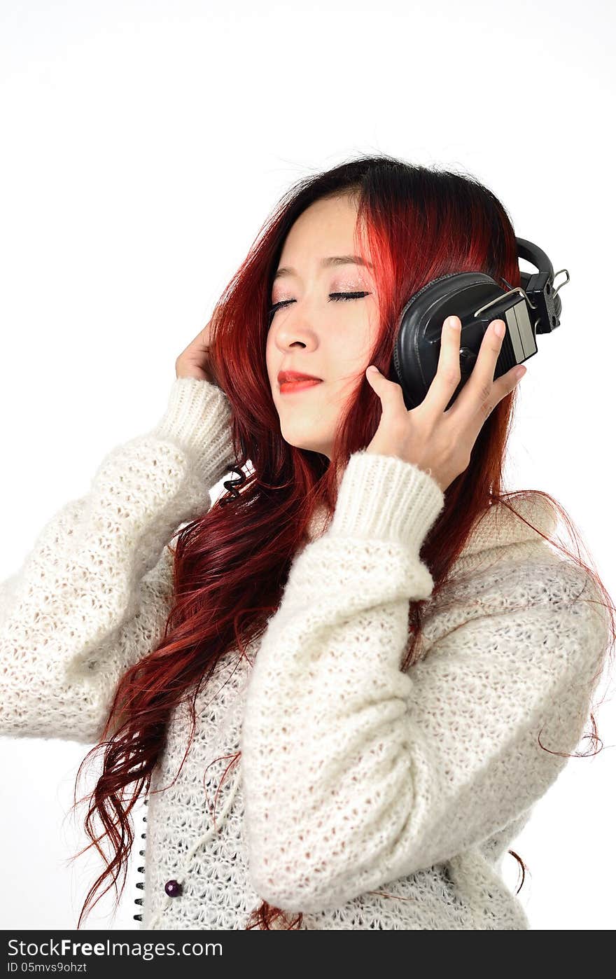 Asian woman with red color long hair listening. Asian woman with red color long hair listening