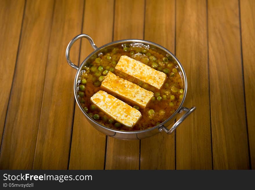 Indian Cheese Cooked with Peas. Indian Cheese Cooked with Peas