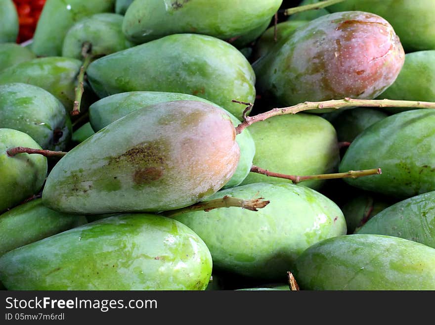 Pile of mango on market tray