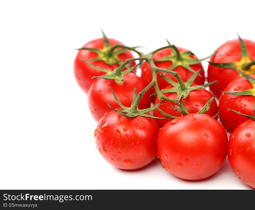 Cluster of cherry tomatoes on the white isolated background