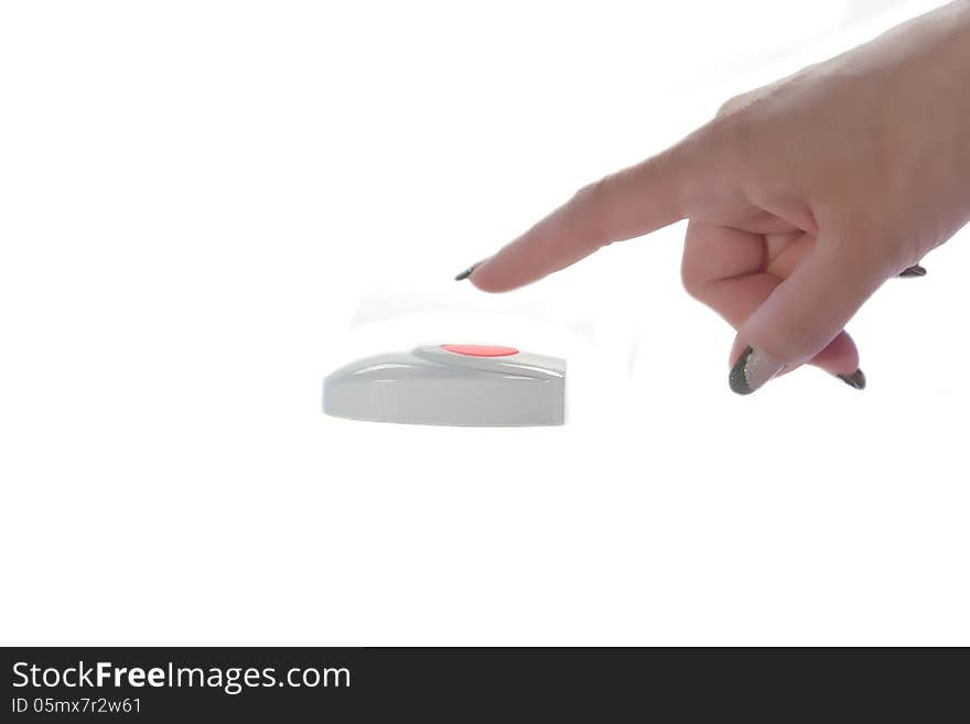 Female finger presses the red button