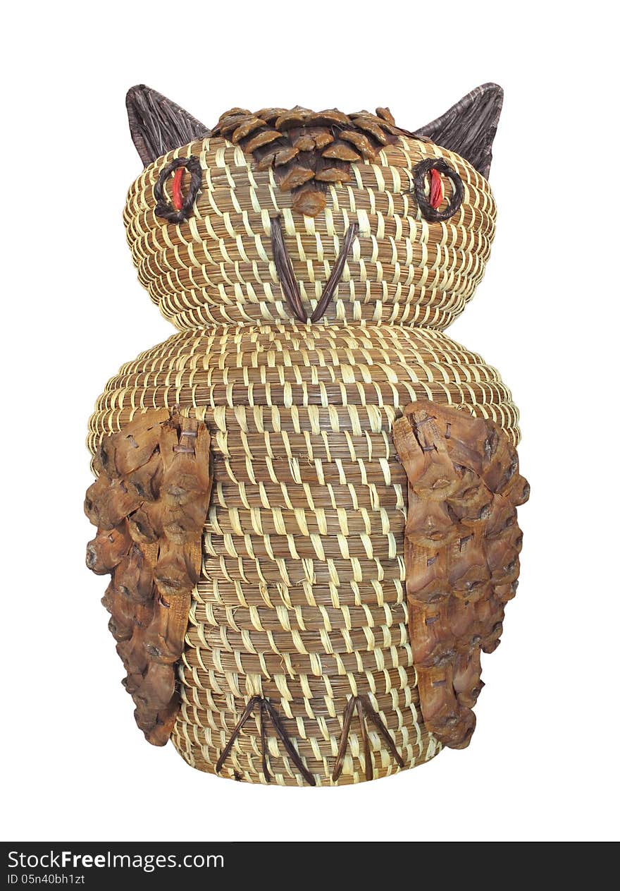 Native American Indian woven raffia basket in the shape of an owl, decorated with pinecones. From the southeastern Koasati Indians. Native American Indian woven raffia basket in the shape of an owl, decorated with pinecones. From the southeastern Koasati Indians.