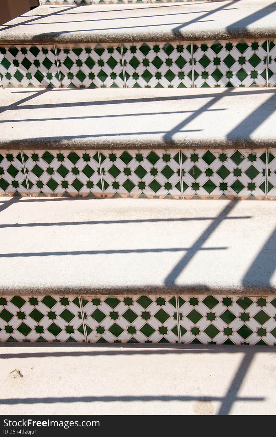 Detail of Spanish stairs with mosaic tiles.