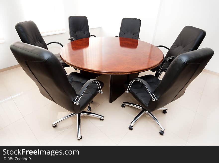 Chairs and a table in the meeting room and talks. Chairs and a table in the meeting room and talks