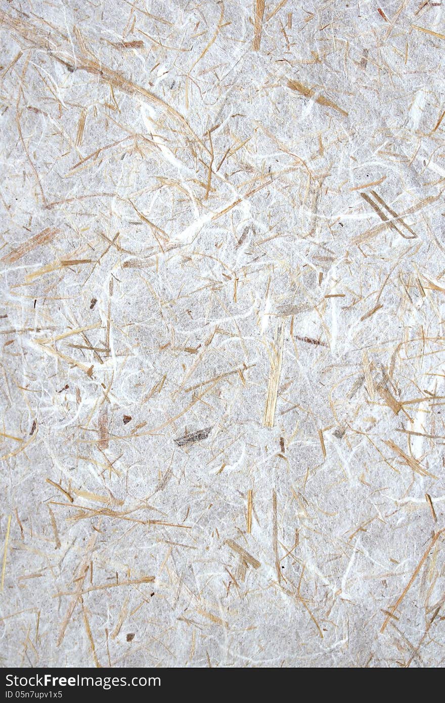 Natural paper background with oat straw and white fibers. Natural paper background with oat straw and white fibers.