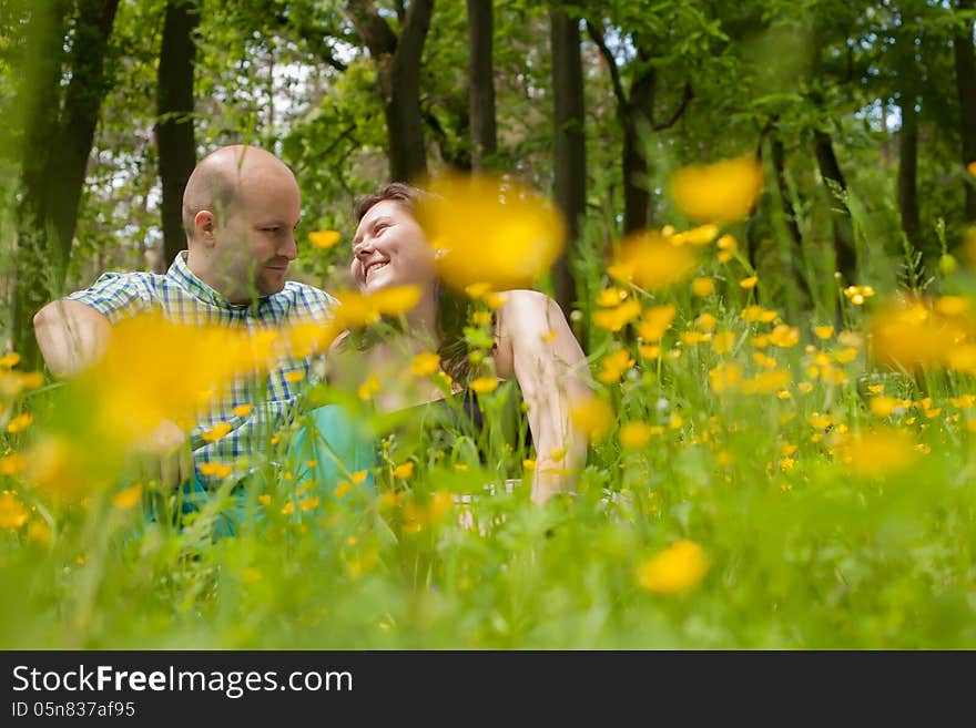 Sweet lovers between the buttercups