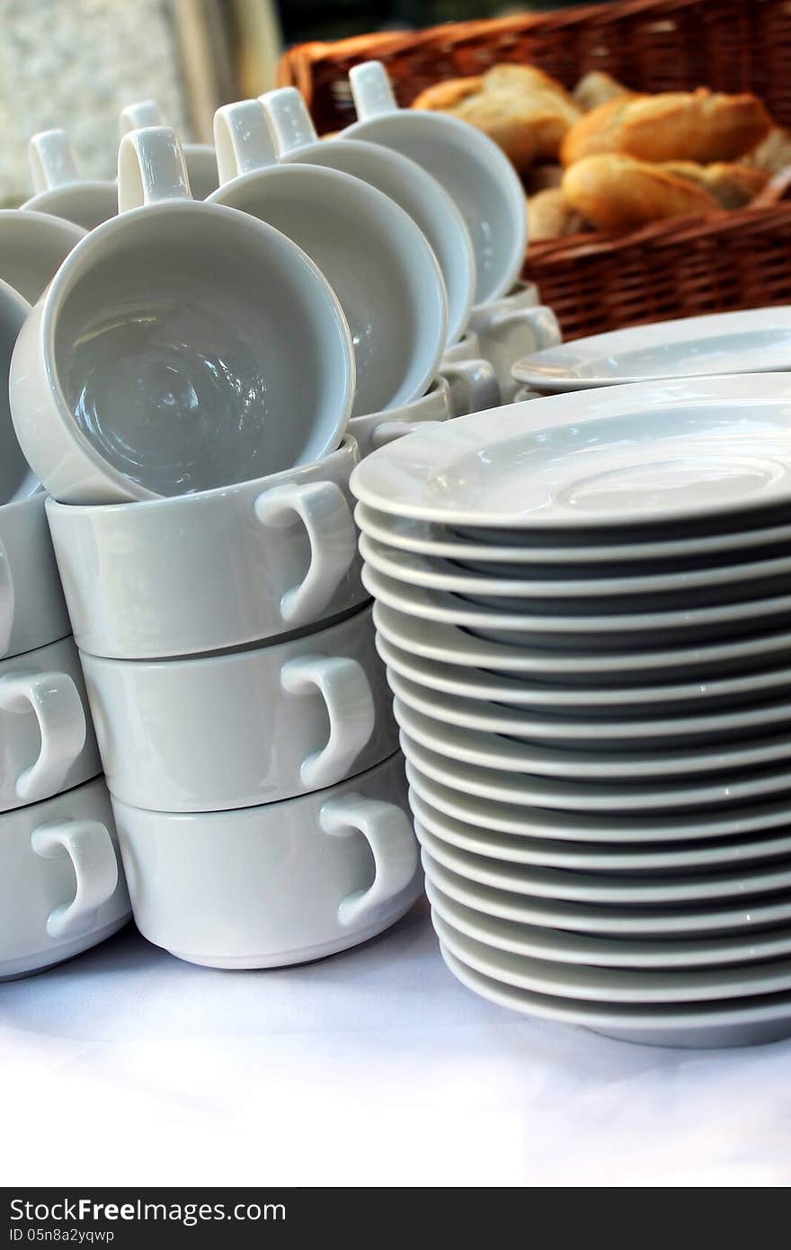 white plates and soup cups