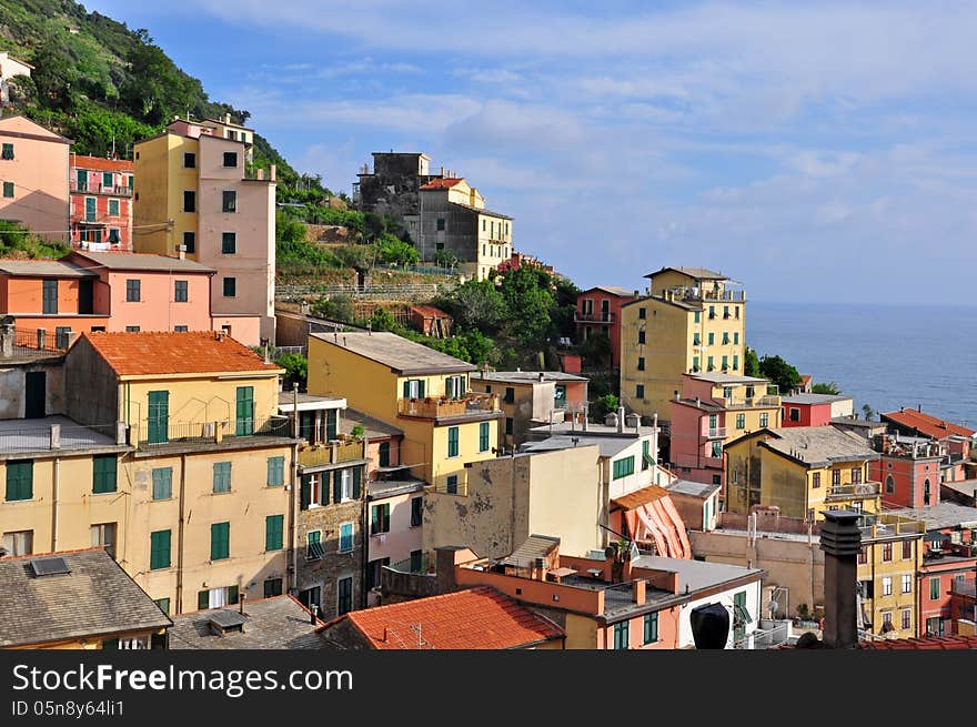 Italian village Riomaggiore on sunset. Italian village Riomaggiore on sunset