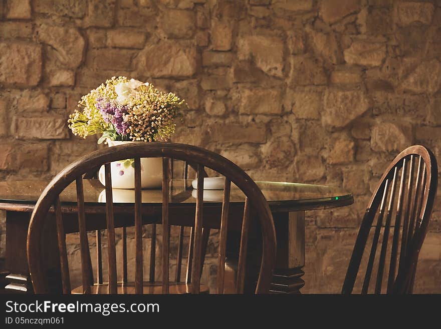 Vintage chair and table with flower