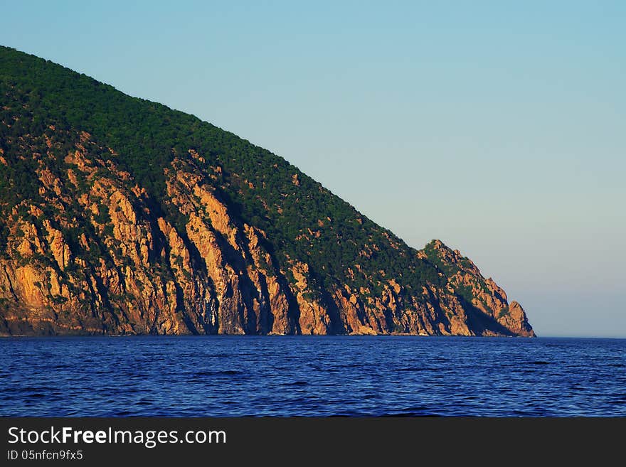 Evening seascape with views of the mountain Ayu-Dag in Gurzuf, Crimea