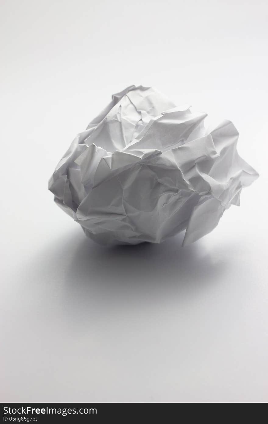 Close up of a paper ball on white background with clipping path