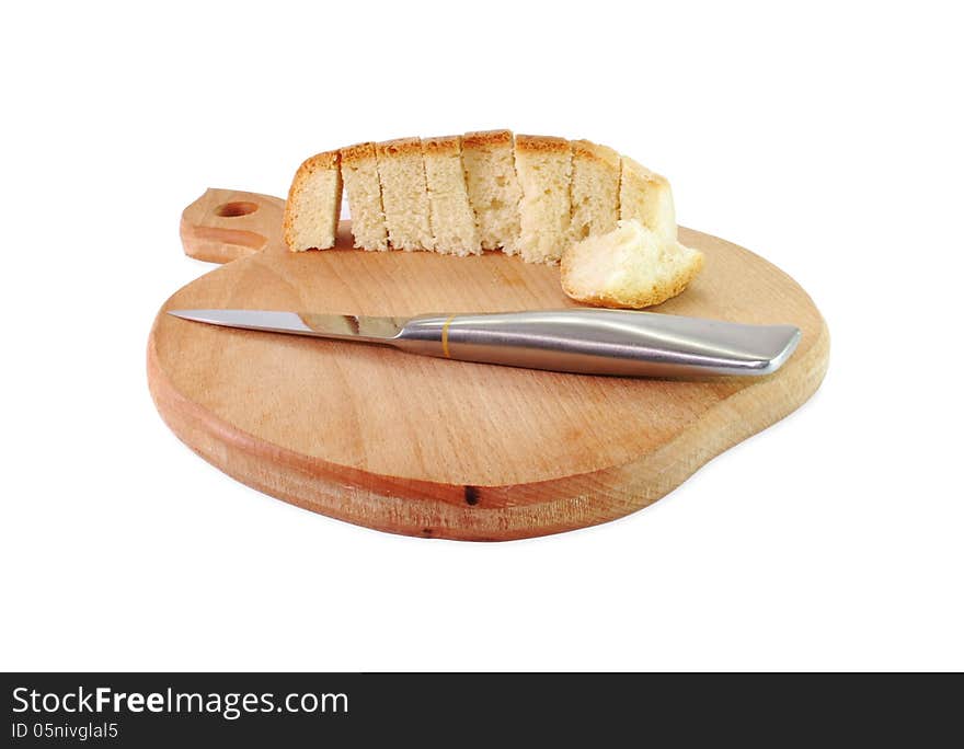 Composition with cutting board sliced bread and knife. Composition with cutting board sliced bread and knife