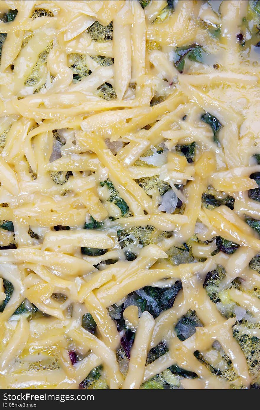 Close-up of grated cheese on the side dish of roasted vegetables