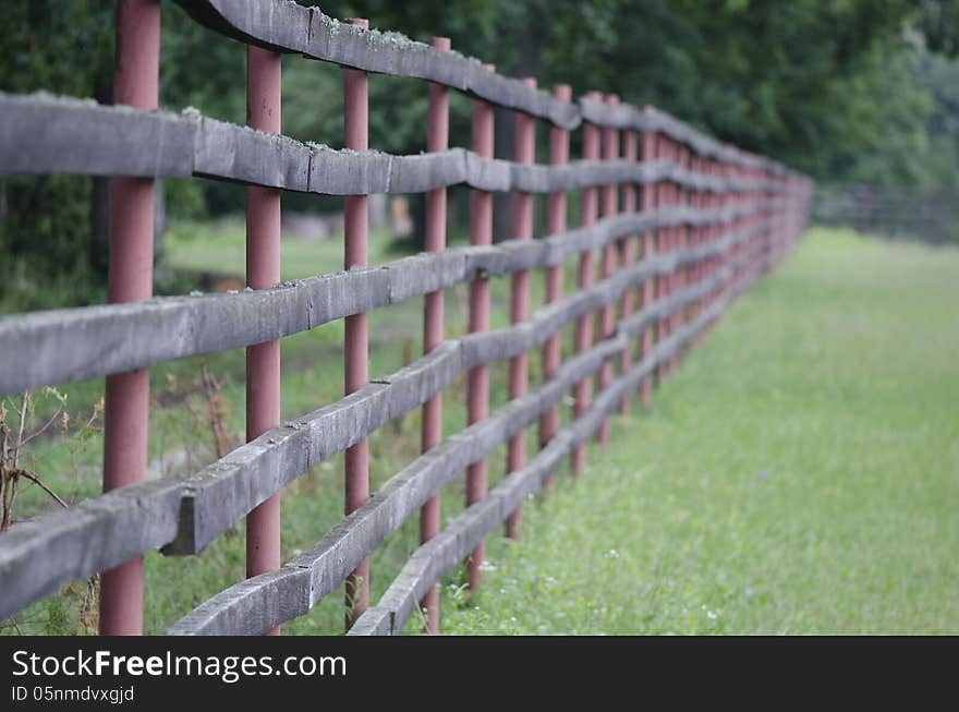 A wooden fence log in a forrest near Targoviste, Romania