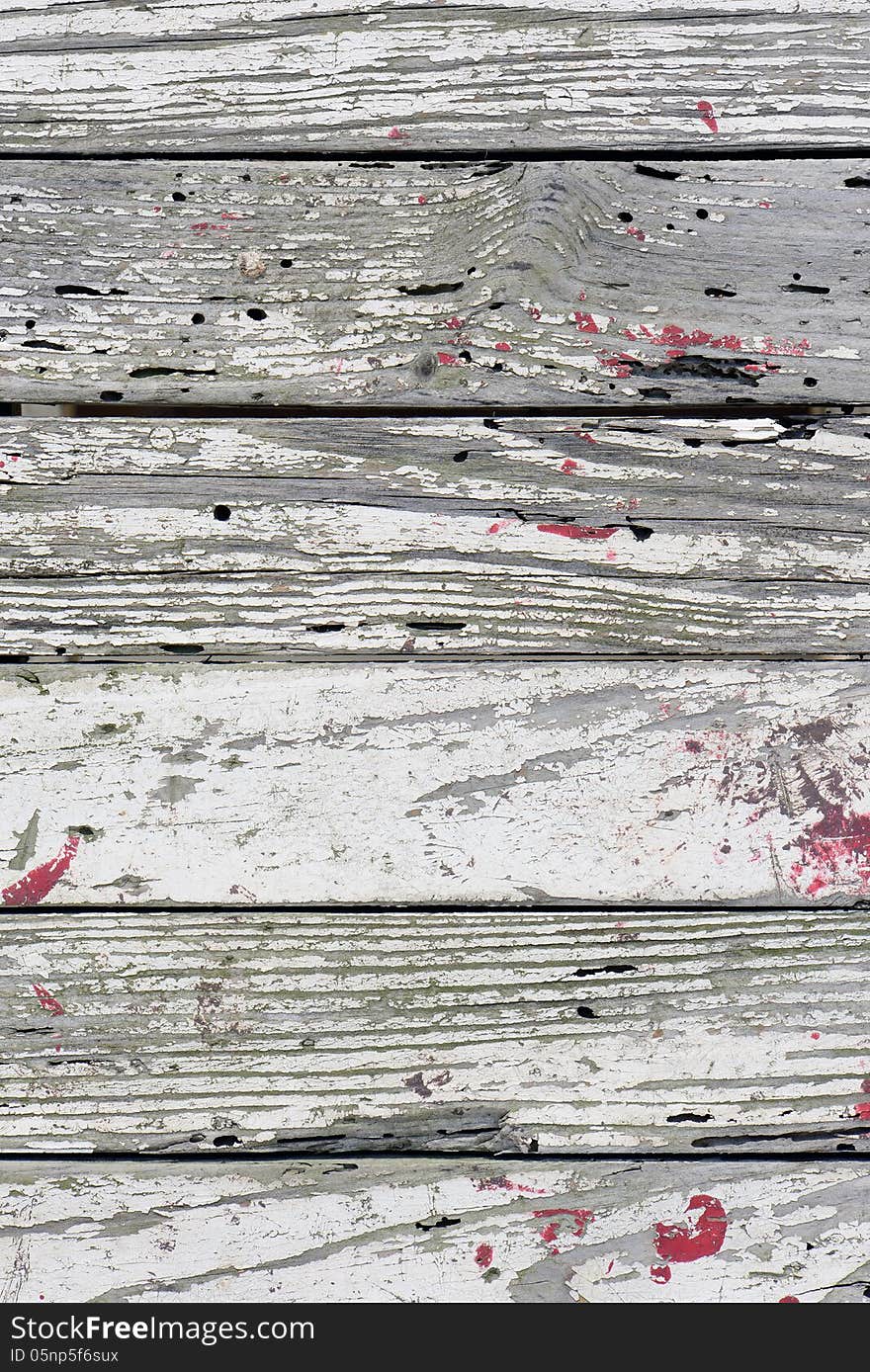 Texture of an old paint with cracks on a wall. Texture of an old paint with cracks on a wall