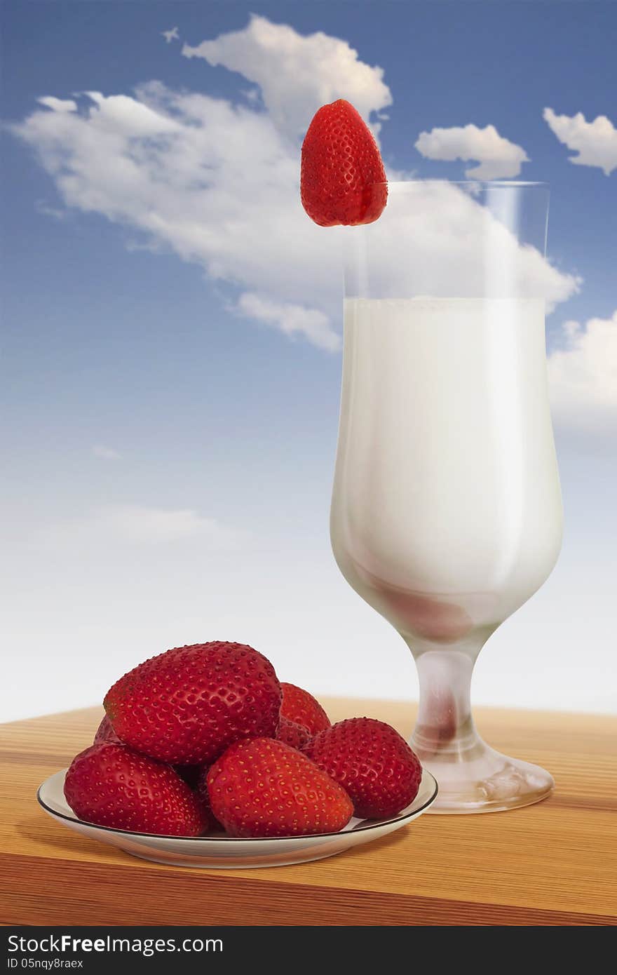 Plateful Of Strawberries With Glass Of Milk