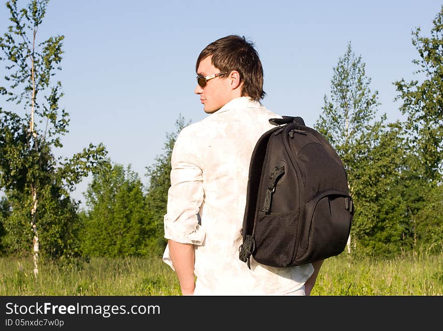 Young man with rucksack outdoor