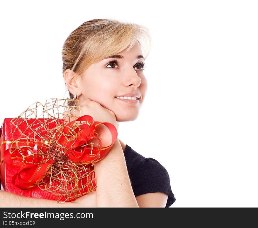 Happy woman holding a gift box