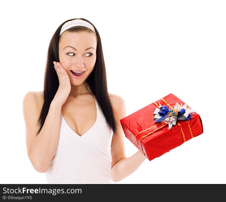 Surprised young woman holding red gift box, isolated on white. Surprised young woman holding red gift box, isolated on white.