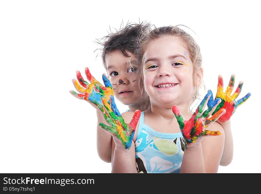 Smiley preschooler boy and girl showing their painted hands. Smiley preschooler boy and girl showing their painted hands