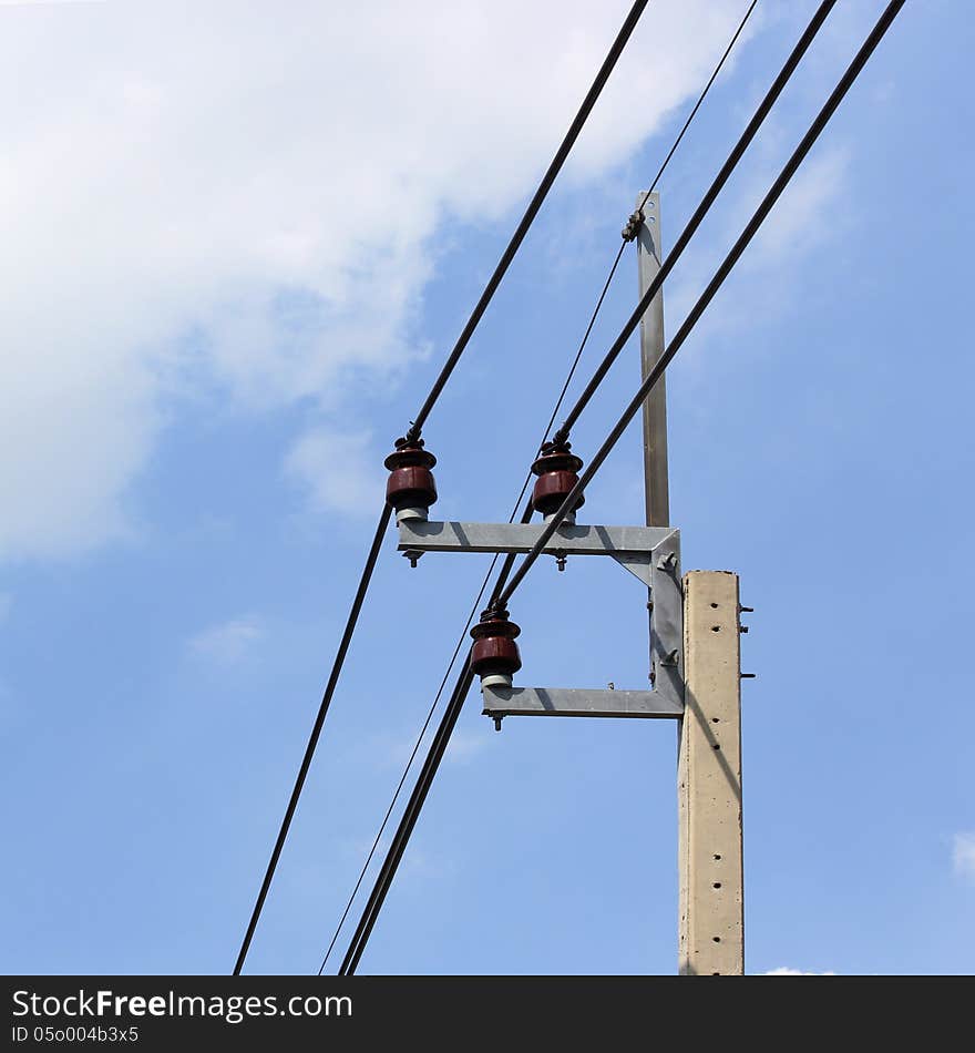 High voltage electric pole on sky background