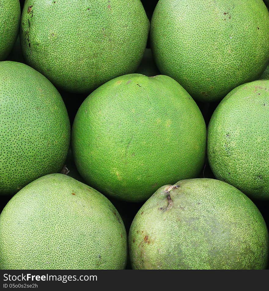 Pile of pomelo on market tray