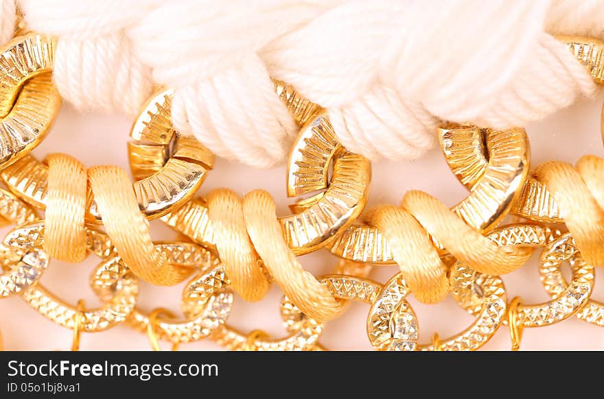 Golden pearls with macrame