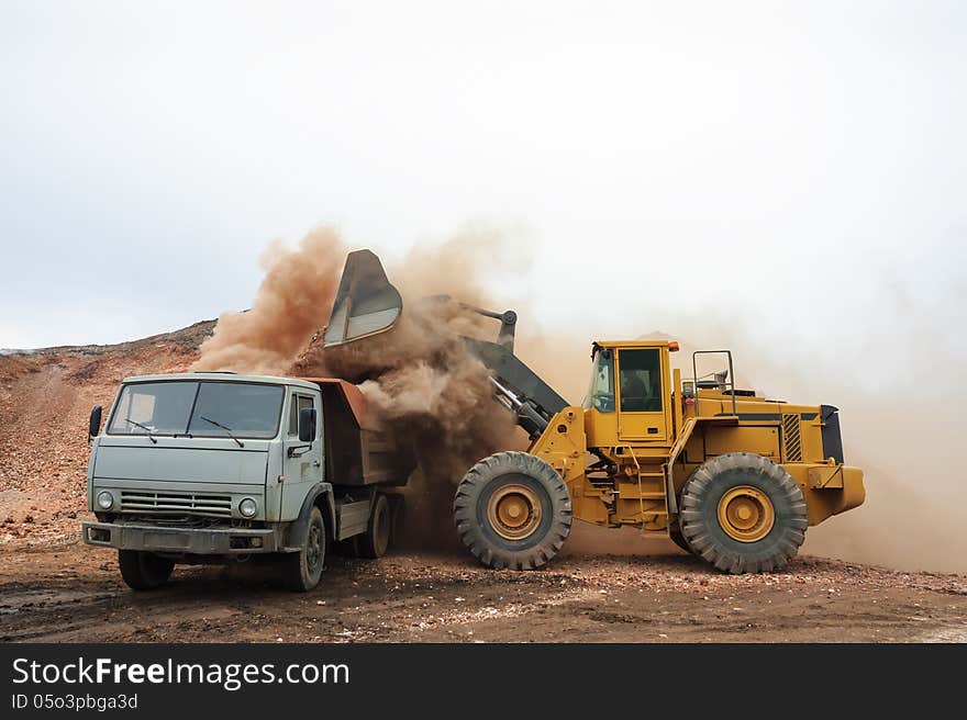 Loading Truck With An Excavator