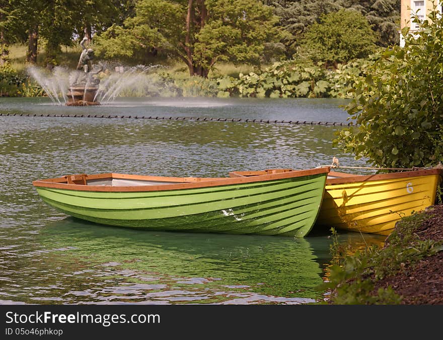 Image of row boats taken in London with statue in the background. Image of row boats taken in London with statue in the background