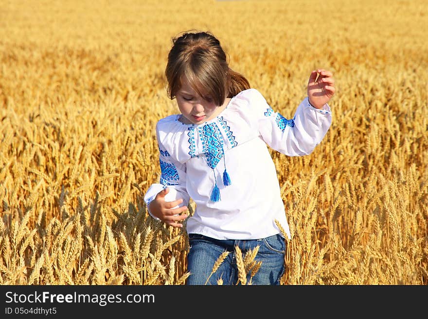 Rural Girl On Wheat Field