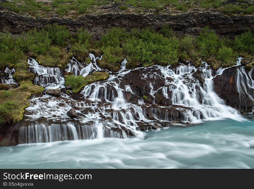 Summer picture of Hraunfossar waterfall in Iceland