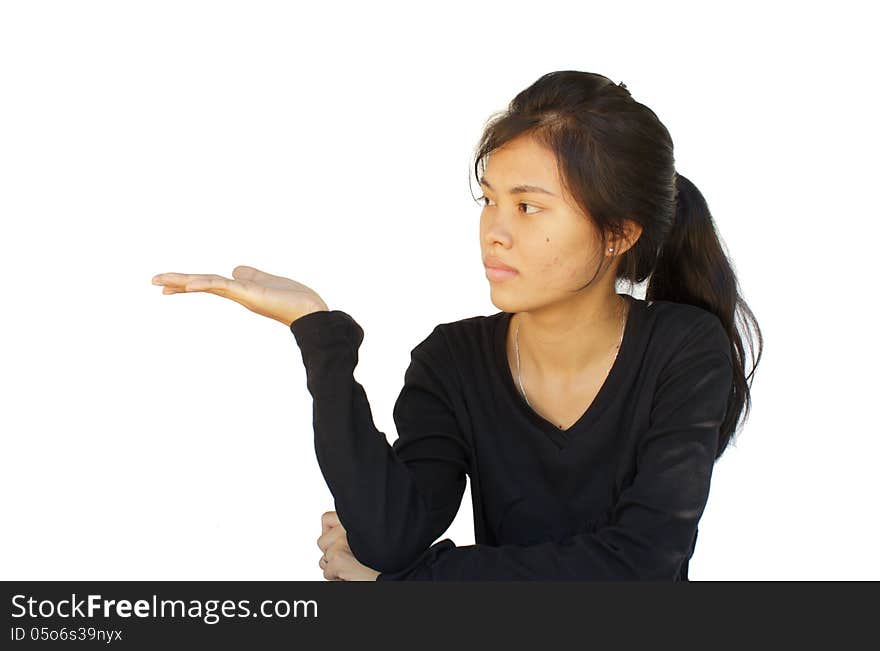 Attractive asian young girl showing on white background