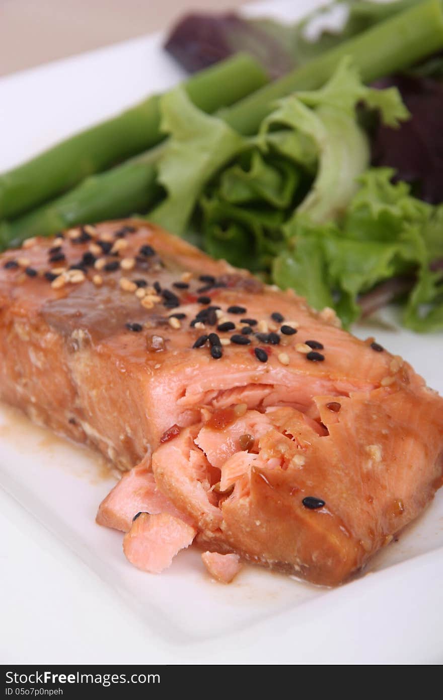 Teriyaki baked salmon on plate. Teriyaki baked salmon on plate