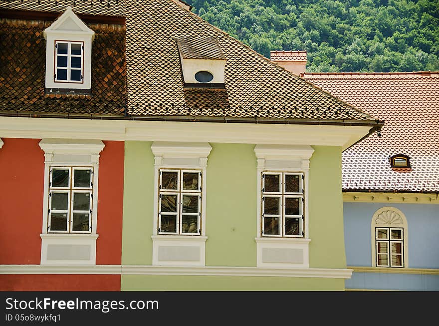 Different colors painted houses in brasov, romania. Different colors painted houses in brasov, romania