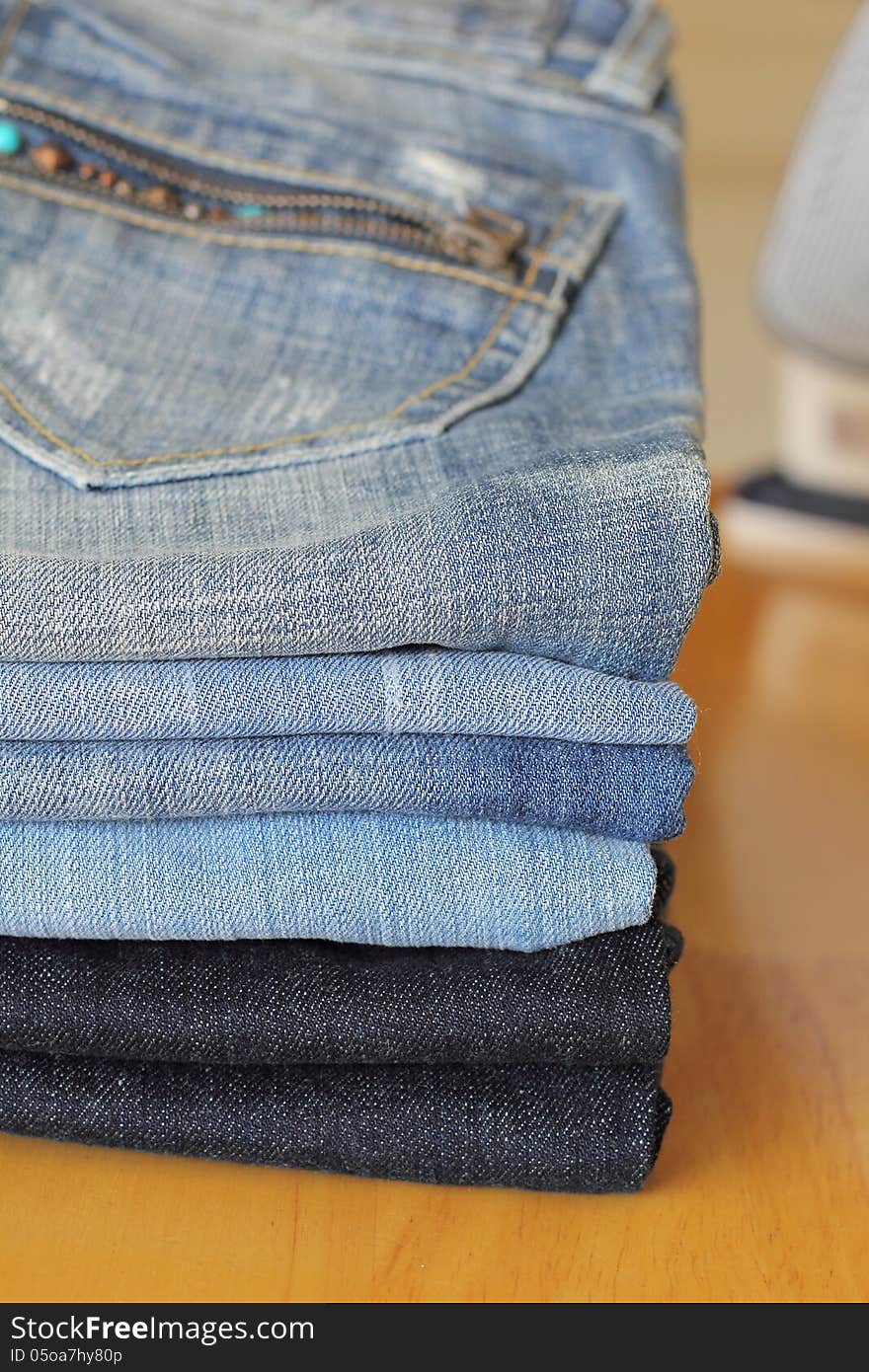 A stack of folded jeans